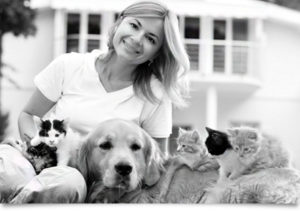 Woman With Dogs and Cats